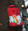 A toy bear Christmas decoration.